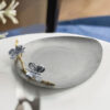 Assiette de fruits de forme triangulaire